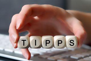 © MH - Adobe Stock.com Foto: Würfel die Tipps buchstabieren